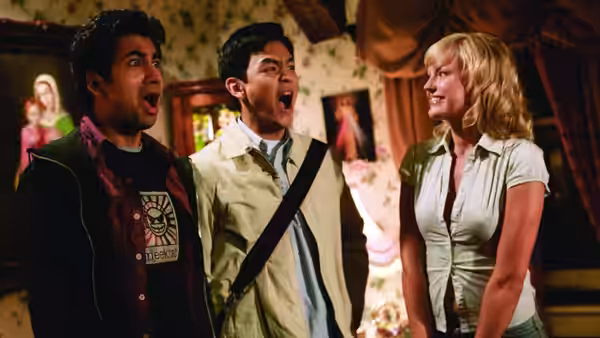Harold and Kumar react as Liane (Malin Akerman) stands beside them