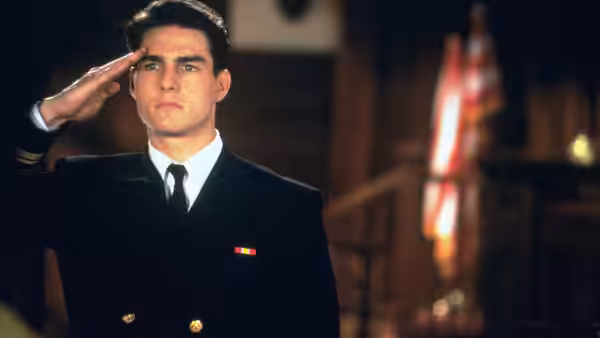 Lt. Daniel Kaffee (Tom Cruise) salutes in his naval dress uniform