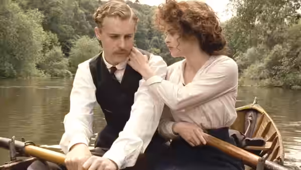 Helen Schlegel (Helena Bonham Carter) touching a man's face in a rowboat