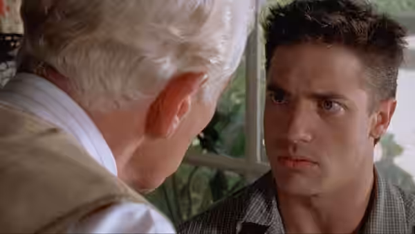 James Whale (Ian McKellen) and Clayton Boone (Brendan Fraser) facing each other closely
