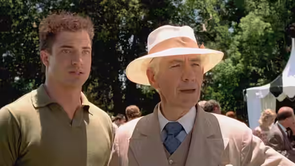 Clayton Boone (Brendan Fraser) and James Whale (Ian McKellen) standing outdoors together