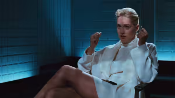 Catherine Tramell (Sharon Stone) gesturing with a cigarette in her hand