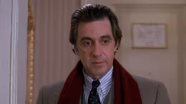 Lt. Col. Frank Slade (Al Pacino) wearing a red scarf indoors