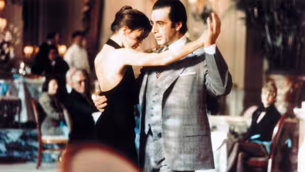 Lt. Col. Frank Slade (Al Pacino) dancing with Donna (Gabrielle Anwar) in a ballroom