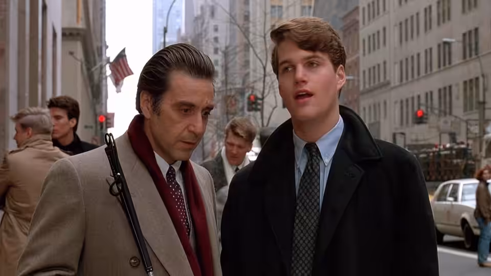 Lt. Col. Frank Slade (Al Pacino) and Charlie Simms (Chris O'Donnell) on a city sidewalk