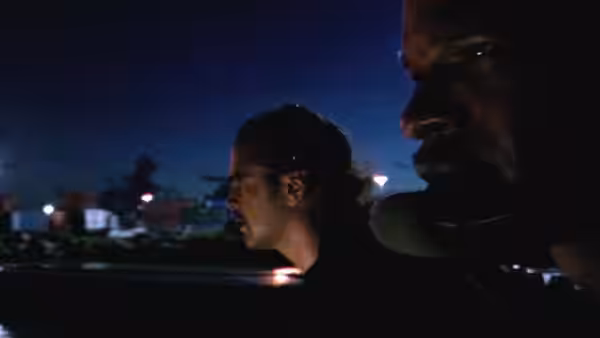 Sonny Crockett (Colin Farrell) and Rico Tubbs (Jamie Foxx) ride through the city at night