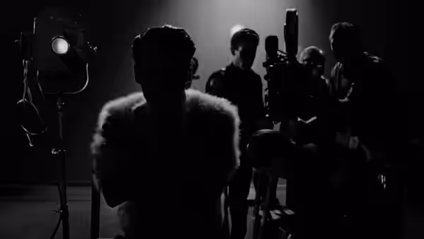 Bunny Breckinridge (Bill Murray) in a fur coat before a film crew