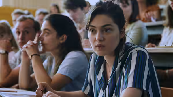 Anne Duchesne (Anamaria Vartolomei) sits among students in a lecture hall