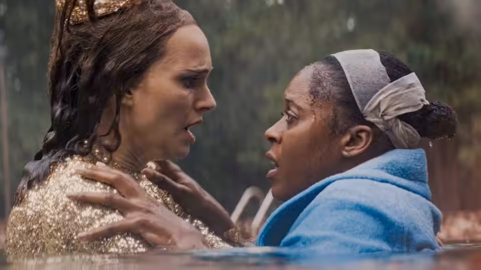 Maddie Schwartz (Natalie Portman) and Cleo Johnson (Moses Ingram) face each other in the water