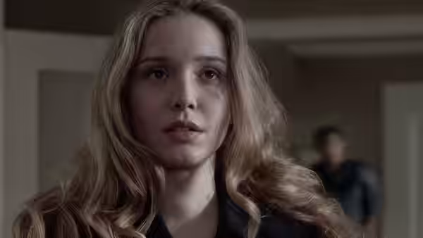 Dominique (Julie Delpy) looking ahead with open mouth