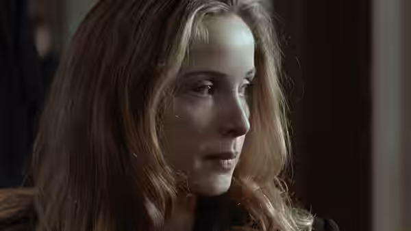 Dominique (Julie Delpy) in profile with long straight hair