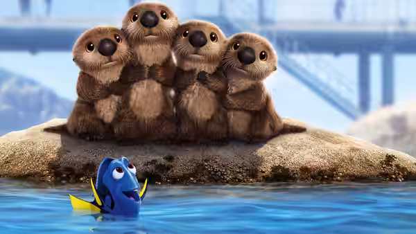 Dory looks up at a huddle of sea otters on a rocky shore