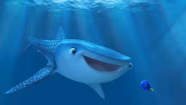 Destiny the whale shark swims beside Dory underwater