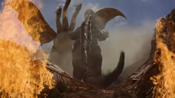 Godzilla battles King Ghidorah amid flames and collapsed structures