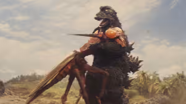 Godzilla grapples with a giant insect in a tropical clearing