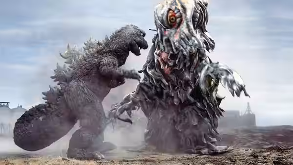 Godzilla grapples with Hedorah on a dusty shoreline