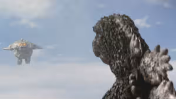 Godzilla faces a distant flying saucer against a cloudy sky