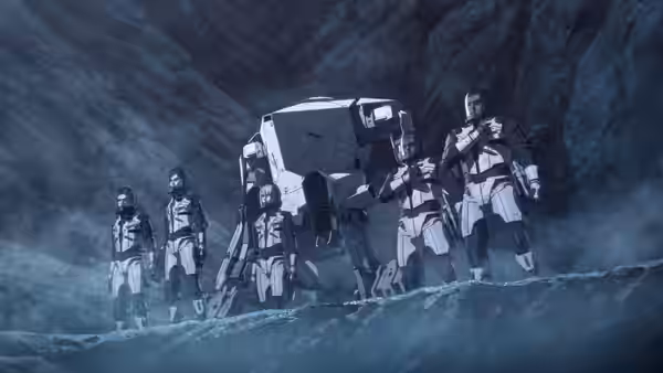 A group of armored soldiers walks through a rocky cavern beside a large machine