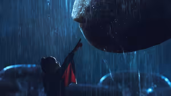 Jia reaches toward Kong in the rain beside parked vehicles