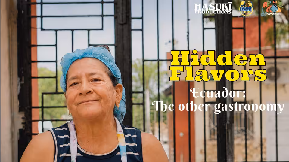 A woman in a blue hairnet and apron stands before a barred window
