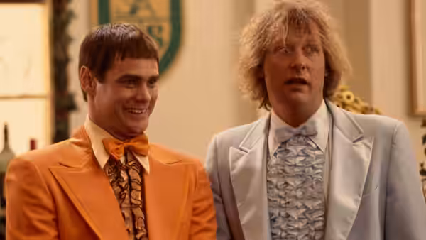 Lloyd Christmas (Jim Carrey) and Harry Dunne (Jeff Daniels) in formalwear looking ahead