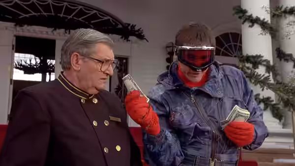An older man in uniform talking to a man in ski gear holding cash
