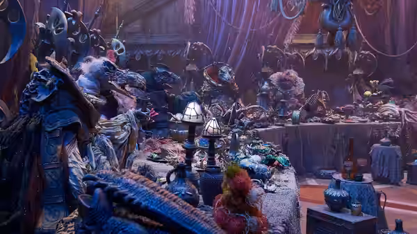 A crowded chamber of robed creatures gathered around a long table laden with food and vessels