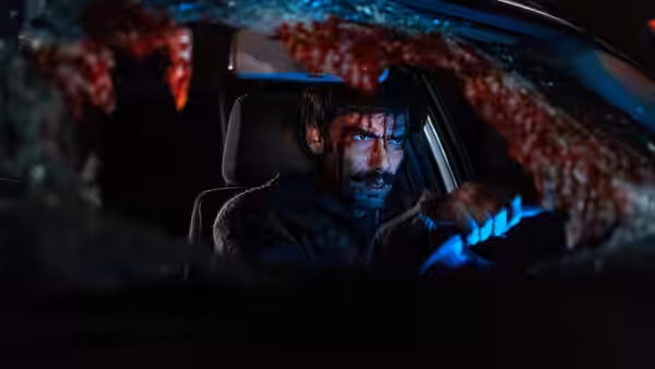 Pedro (Ezequiel Rodríguez) drives through the dark with blood smeared across the windshield