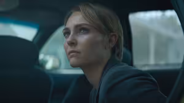 Summer McBride (AnnaSophia Robb) looks out from inside a car