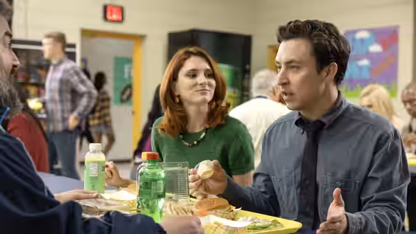 Evan Marquez (Brian Jordan Alvarez) talks over lunch as Gwen Sanders (Stephanie Koenig) watches