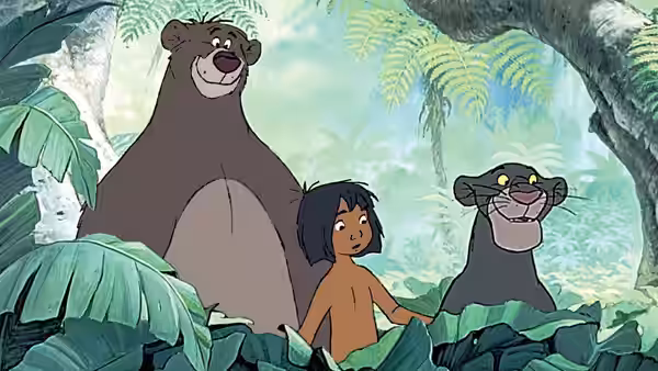 Mowgli stands between Baloo the bear and Bagheera the panther in the jungle