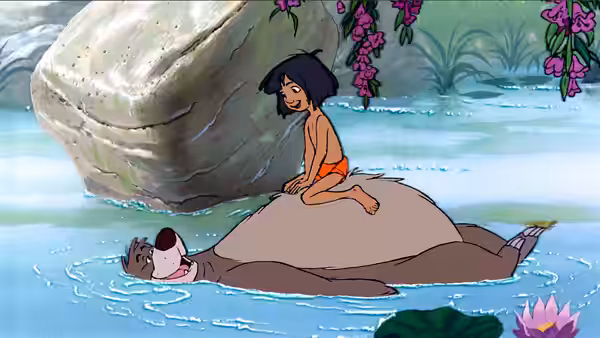 Mowgli sits on Baloo the bear floating in a jungle river