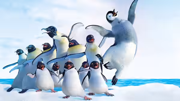 Mumble (Elijah Wood) leaps above a crowd of penguins on the snowy shore