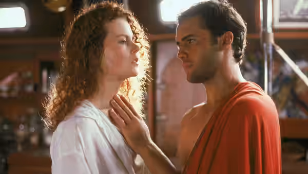 Rae Ingram (Nicole Kidman) faces Hughie Warriner (Billy Zane) in the boat's cabin