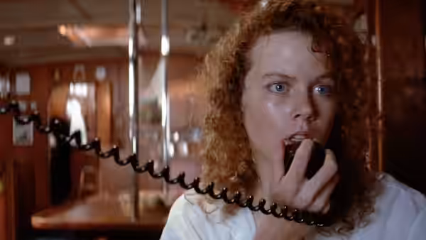 Rae Ingram (Nicole Kidman) speaks into a radio handset inside the boat