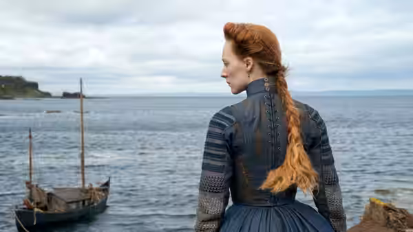 Mary Stuart (Saoirse Ronan) watches a boat from the shore