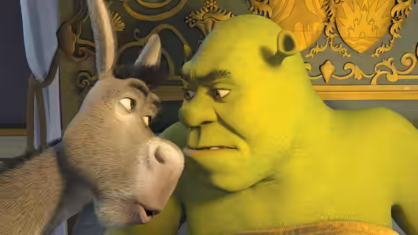 Donkey leans close to Shrek in an ornate palace room