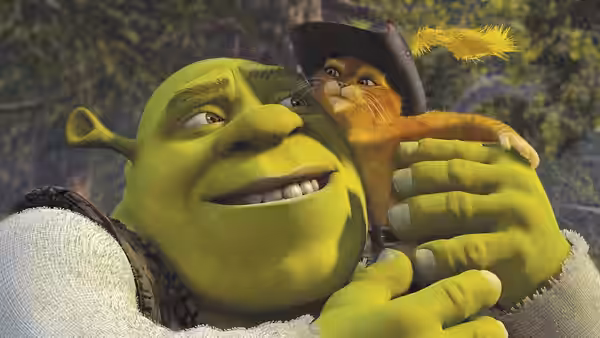 Shrek holds Puss in Boots close in a forest