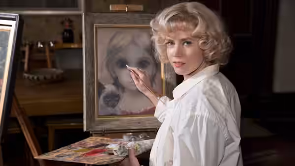 Margaret Keane (Amy Adams) paints a large-eyed girl in her studio