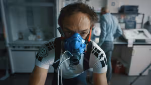 Bryan Fogel wearing a breathing mask during a laboratory fitness test