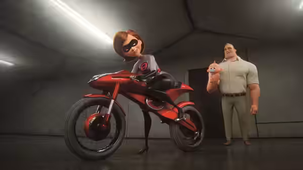 Elastigirl sits astride a red motorcycle as Bob holds Jack-Jack in a garage