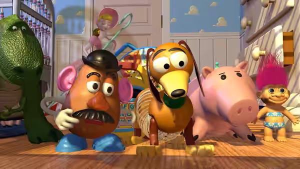 Mr Potato Head Slinky Dog Hamm Rex and others standing together