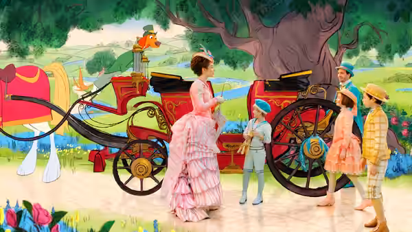 A woman in a pink dress meets children beside a brightly painted carriage in an animated landscape
