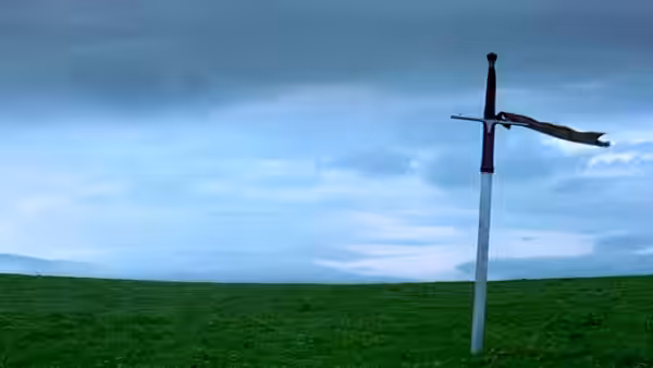 A sword embedded upright in an open grassy field under clouds