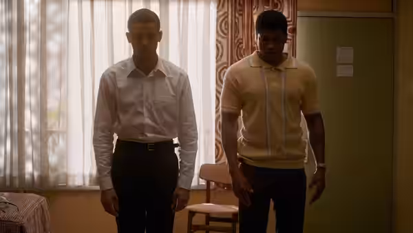 Malcolm X (Kingsley Ben-Adir) and Cassius Clay (Eli Goree) stand in a room