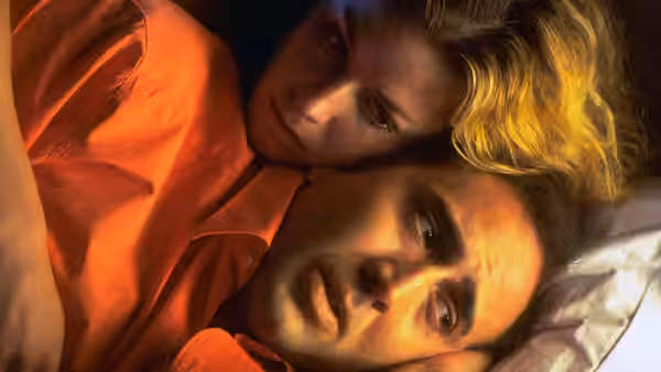 Ben Sanderson (Nicolas Cage) and Sera (Elisabeth Shue) resting in bed