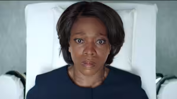 Warden Bernadine Williams (Alfre Woodard) lies on a pillow, staring upward