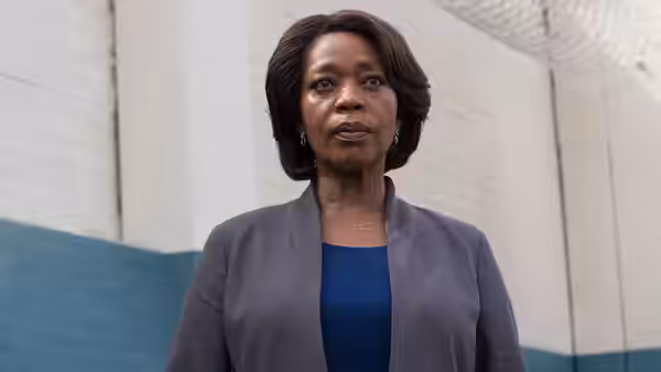 Warden Bernadine Williams (Alfre Woodard) stands in a prison corridor