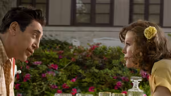 Desi Arnaz (Javier Bardem) and Lucille Ball (Nicole Kidman) face each other across a garden table