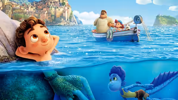 Luca swims underwater as Alberto paddles nearby and Massimo rows with Giulia in a boat